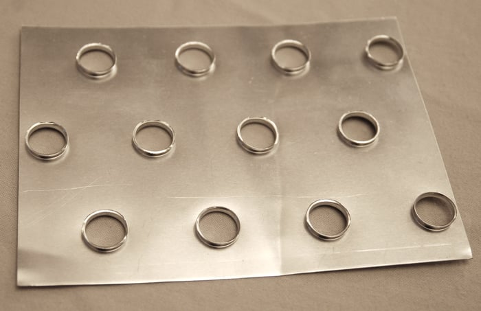aluminum flat fin example against a gray backdrop