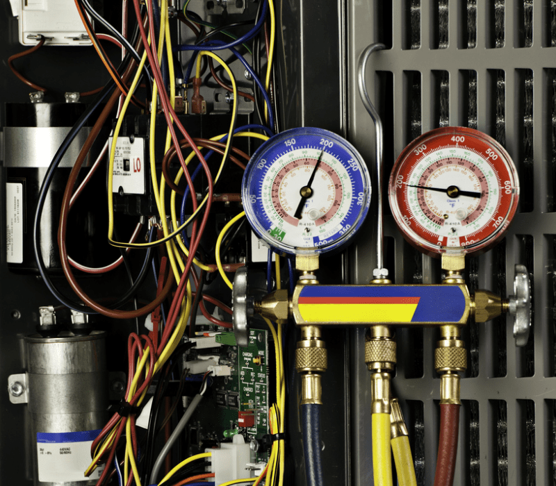 refrigerant gauges being used in the capture of refrigerant