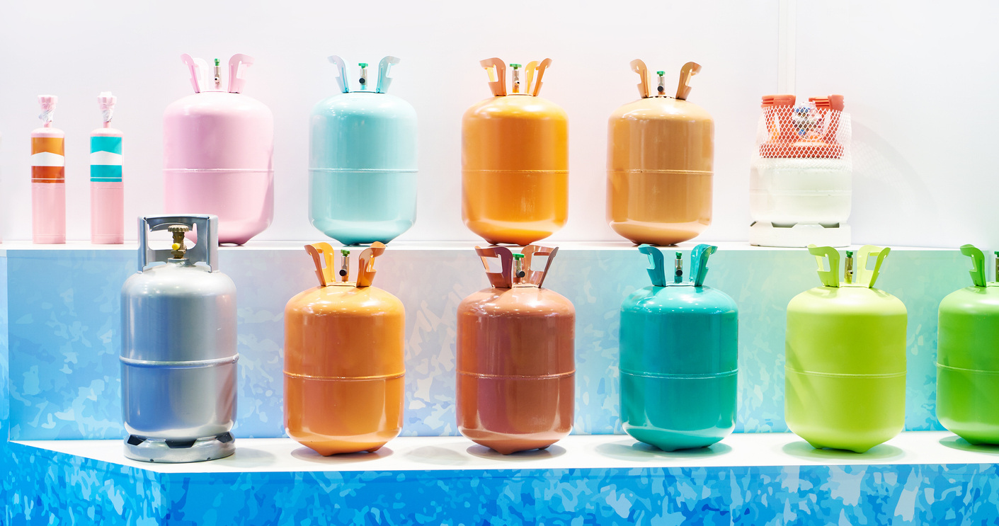 arrangement of multiple refrigerant canisters of different colors